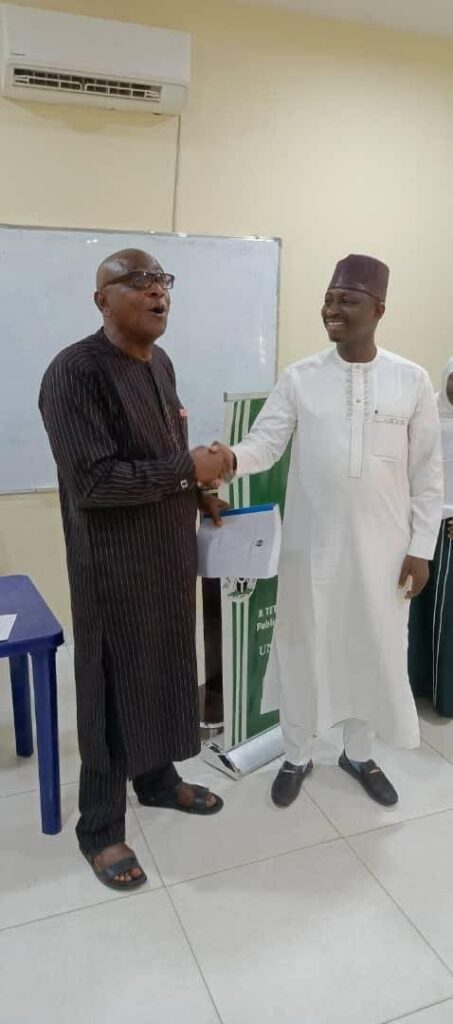 Prof. Ali Ahmad Congratulates Dr. Ibrahim Mohammed Ajia on the Conferment of Doctorate Degree in Policy and Strategic Studies